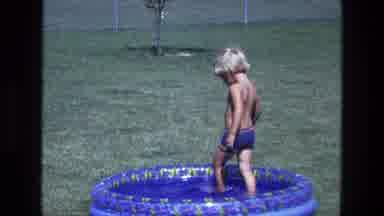 California USA (1975): A Small Child Was Around In An Inflatable Kiddie Pool