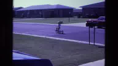 California USA (1975): A Blonde Child Who Lives In The Suburbs Is Playing And