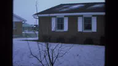 California USA (1975): 1878 Snow Day Take One A Homes Landscape And Excited Boy