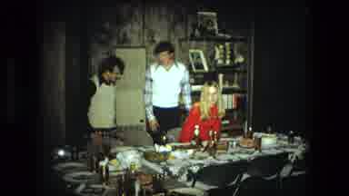 Fort Wayne Indiana (1976): Man Wearing White Sweater Helps Girl Wearing Red
