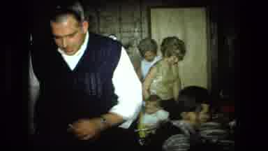 Fort Wayne Indiana (1976): Family Taking Their Seats Around A Dinner Table