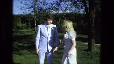 Fort Wayne Indiana (1976): Bride And Groom Outdoors Kissing Holding Hands Then