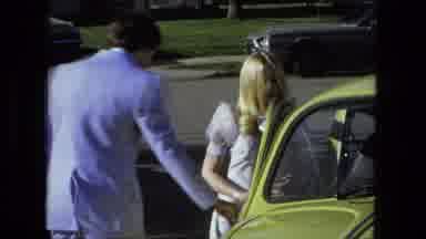 Fort Wayne Indiana (1976): Footage Of A Male In A Blue Suit Opening The Car Door
