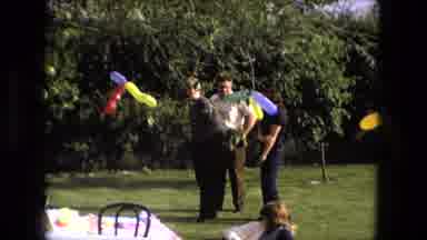 Fort Wayne Indiana (1976): Two Different Guys Wave At The Camera One Seems Shy And