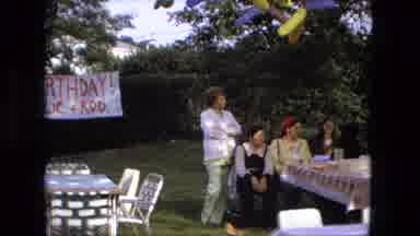 Fort Wayne Indiana (1976): A Gathering Of People Sit Around A Picnic Table Outside