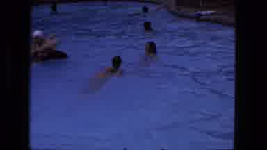 Fort Wayne Indiana (1976): People Swim In A Public Pool And A Young Woman Smiles