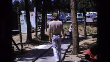 Fort Wayne Indiana (1976): Mom And Girl At An Amusement Park Riding A Small Car