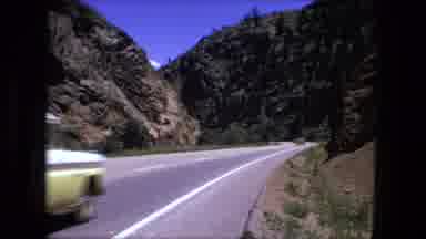 Fort Wayne Indiana (1976): Mountainside Video Of Vintage Cars Driving Along A Road
