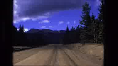Fort Wayne Indiana (1976): Cars Driving On A Highway Area Of Forest And Mountains