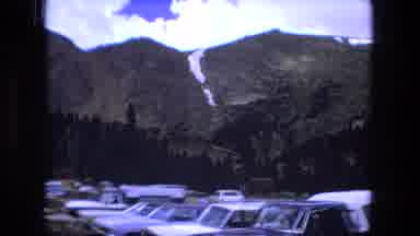 Fort Wayne Indiana (1976): Two People Walk Together Away From The Parking Lot Into