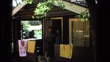 Fort Wayne Indiana (1976): Young Man Stands Outside The Cabin And Talks To Young
