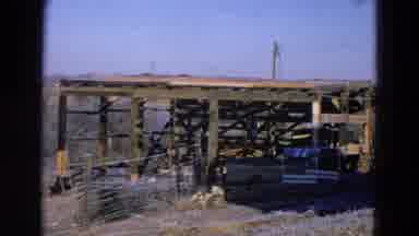 Diller Nebraska (1968): An Old Building Near Power Line