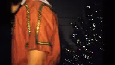 Diller Nebraska (1968): Person Wearing Red Dress Stands Next To Fully Trimmed