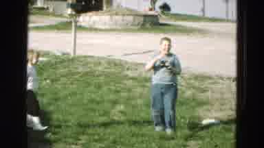 Diller Nebraska (1968): A Boy And A Young Girl Play Smile As They Play With A Pair