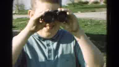 Diller Nebraska (1968): Boy Looking Through Binoculars And Then Taking Them Off