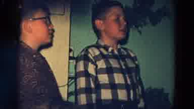 Diller Nebraska (1968): Person Dressed As Santa Visits Group Of Kids While Two