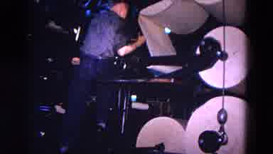 Trenton New Jersey (1967): Two Men Are Adjusting Large Paper Rolls Spinning In A