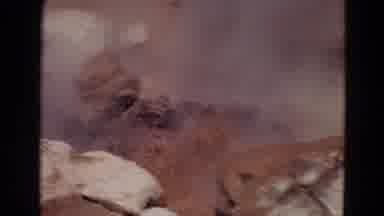 Yellowstone Park Wyoming (1967): Mud And Steam Spew Violently Up From Behind Some