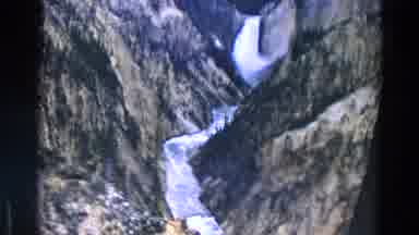 Yellowstone Park Wyoming (1967): Snow Falling Down A Slope Off The Mountain