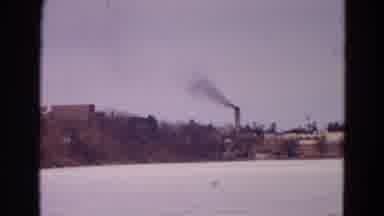 Yellowstone Park Wyoming (1967): Factory Smokestack Spewing Black Smoke While