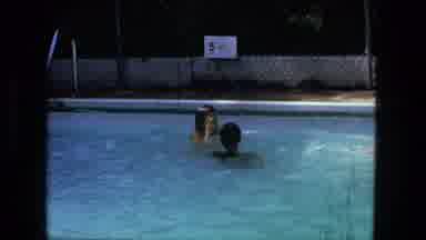 Fort Wayne Indiana-1976: Blond Kid Swimming With Other Children In A Public Pool