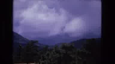 Fort Wayne Indiana (1976): Old Footage Of A Beautiful Mountain Side On A Cloudy