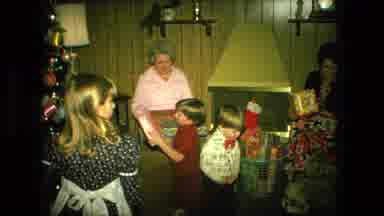 Fort Wayne Indiana (1976): A Family Gathers Around The Christmas Tree There Is A