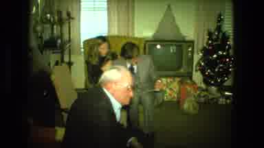Fort Wayne Indiana (1976): People Having A Get Together During Christmas Season