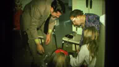 Fort Wayne Indiana (1976): A Group Of People Are Together Opening Presents During