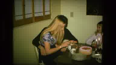 Fort Wayne Indiana (1976): Woman Unboxing A Present From A Partner During Birthday