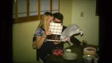 Fort Wayne Indiana (1976): Woman Sitting On A Man As They Both Open A Present