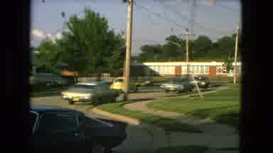 Fort Wayne Indiana (1976): A Lot Of Cars Parking And A Yellow Car Drive By