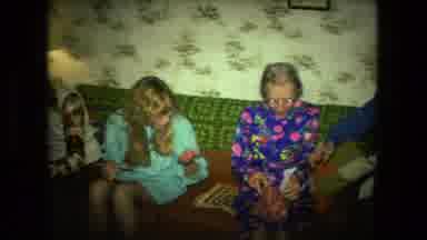 Fort Wayne Indiana (1976): People At A Party Or Gathering Passing Around Something