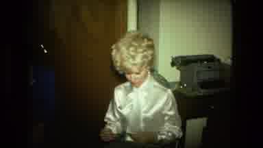 Fort Wayne Indiana (1976): Woman Opening Envelope In Chair