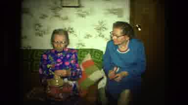 Fort Wayne Indiana (1976): Two Elderly Women Seated On A Couch Overhung With