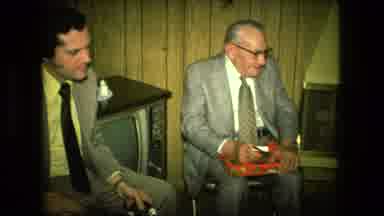 Fort Wayne Indiana (1976): Two Persons Are Sitting In The Chair And Talking About