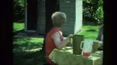 Fort Wayne Indiana (1976): Small White Pet Dog Walking Around Outside As Two Women