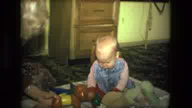 Fort Wayne Indiana (1976): Baby Plays With Toys On A Blanket