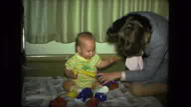 Fort Wayne Indiana (1976): Mom Playing With Baby And Toys At Home