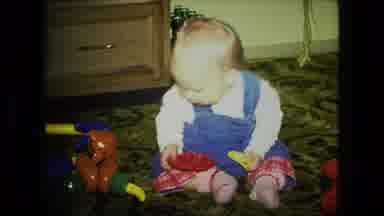 Fort Wayne Indiana (1976): Content Small Child Sitting On A Carpeted Floor Playing