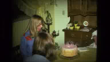 Fort Wayne Indiana (1976): Blonde Haired Woman Happily Blowing Out Candles On Her