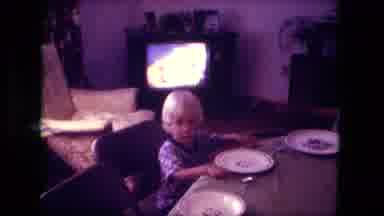 Fort Wayne Indiana (1976): Child Eating Dinner At Table With Tv On