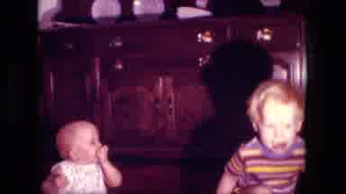 Fort Wayne Indiana (1976): The Little Child Is Eating And Simply Sitting Doing