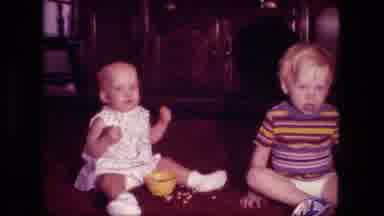 Fort Wayne Indiana (1976): Two Young Children Sitting On A Carpeted Floor Together