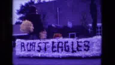 Fort Wayne Indiana (1976): A Float Which Reads Roast Eagles Is Pulled By A Tractor