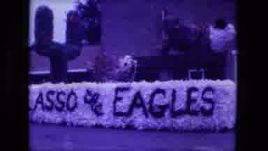 Fort Wayne Indiana (1976): Float Football Field Goal Car Mascots Buildings Driving