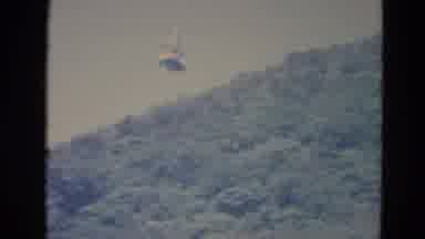 Minnesota (1976): The Sky Gondola Travelling Over The Thick Forest Canopy