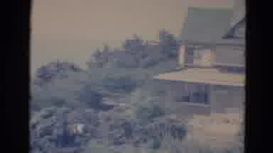 Minnesota (1976): A House In The Lush Green Forest At A Quiet Place