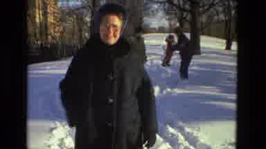 Drexel Hill Pennsylvania (1978): Man Wearing Brown Coat Walks Dog In Snow On A