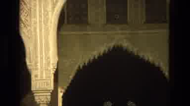 Cordoba Spain (1978): People Walk Around Under An Arabesque Structure
